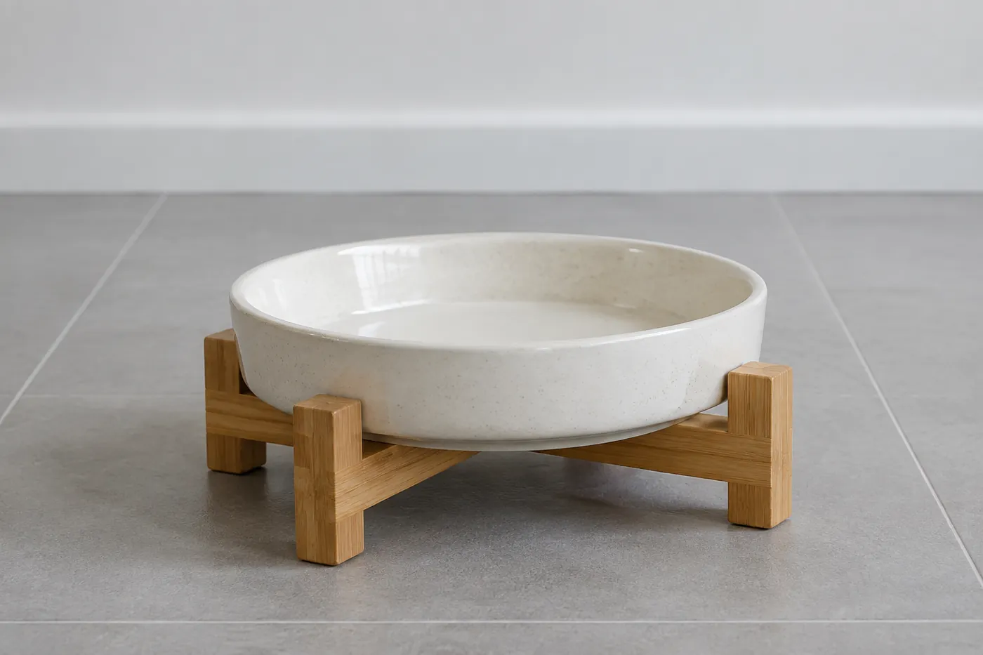 A wide shallow bowl raised slightly on a low stand